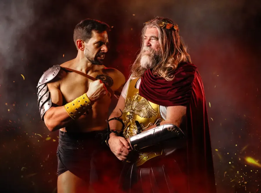 A gladiator face to face with the Emperor in a red cape